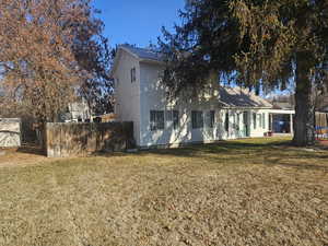 Exterior space featuring a front yard