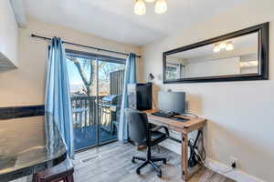 Home office with a textured ceiling