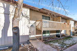 Rear view of property featuring a balcony