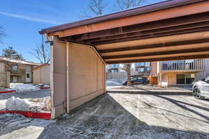 Exterior space featuring a carport