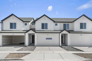 View of front of home with a garage