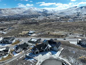 Snowy aerial view with a mountain view