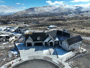 Birds eye view of property with a mountain view