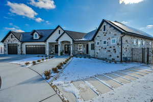 View of front of home featuring a garage