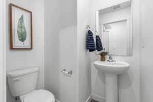 Bathroom with sink and toilet