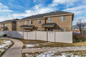 View of snow covered property