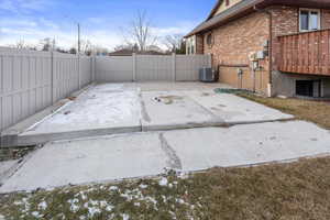 View of patio featuring central AC unit