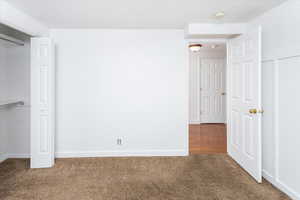 Unfurnished bedroom featuring carpet flooring