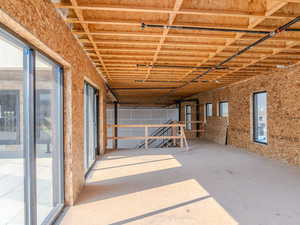 Interior space featuring concrete flooring