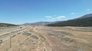 Property view of mountains with a rural view
