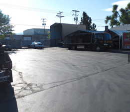 View of vehicle parking with a carport