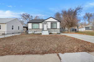 View of front of house featuring a carport