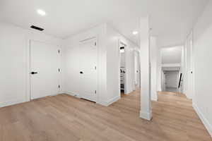 Interior space with light hardwood / wood-style floors