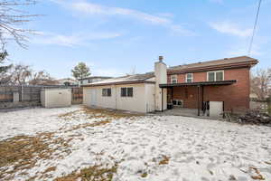 View of snow covered property