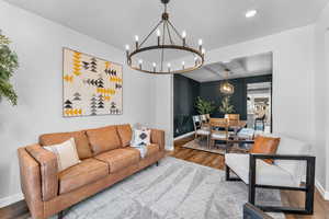 Living room with wood-type flooring