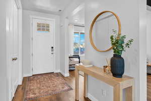 Entryway featuring dark hardwood / wood-style flooring