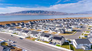 Aerial view featuring a water and mountain view