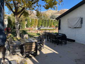 View of patio / terrace with a mountain view