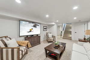 Living room featuring light colored carpet