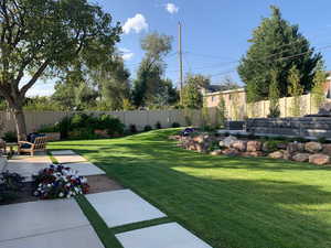 View of yard with a patio