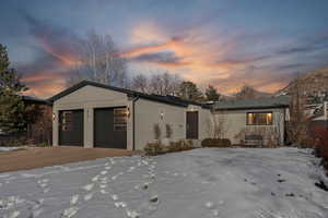 View of front of home featuring a garage