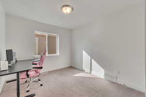 Office area with light carpet