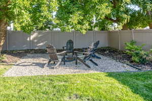 View of yard featuring an outdoor fire pit