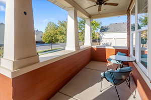 Balcony featuring ceiling fan and covered porch