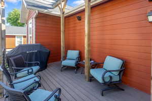 Wooden terrace with grilling area