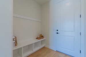 Mudroom featuring light wood-type flooring