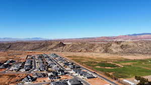 Birds eye view of property with a mountain view