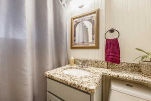 Bathroom featuring toilet and vanity