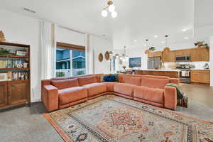 Living room with an inviting chandelier