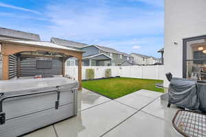 View of patio / terrace with a gazebo and a hot tub