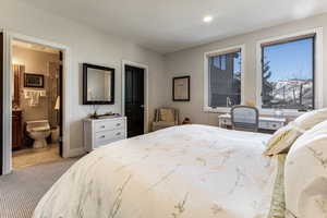 Bedroom featuring ensuite bath