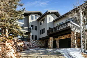 View of property featuring a garage