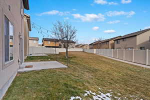 View of yard with a patio area