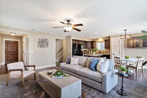 Living room with sink and ceiling fan