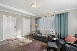 Living room with hardwood / wood-style floors ADU