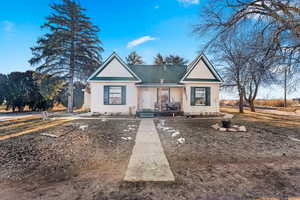 Bungalow featuring a porch