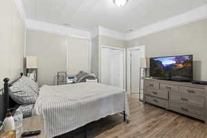 Bedroom with hardwood / wood-style flooring  MAIN HOME