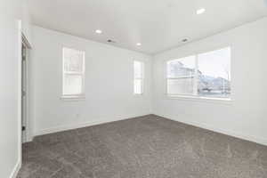 Master bedroom with walk in closet and full bathroom.