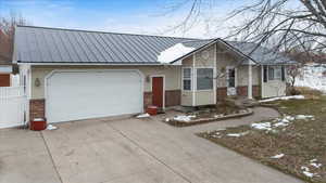 View of front of property with a garage