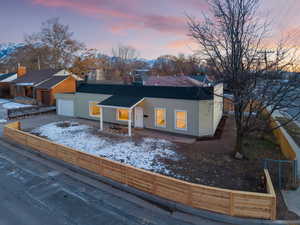 View of front of property with a garage