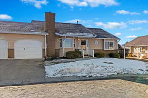 View of front of home with a garage