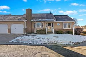 Ranch-style house with a garage