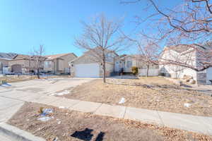 Single story home featuring a garage