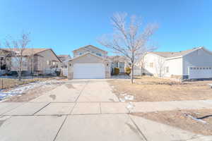 View of front of home featuring a garage