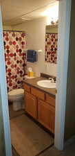 Bathroom with vanity and toilet