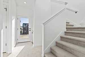 Staircase with carpet floors